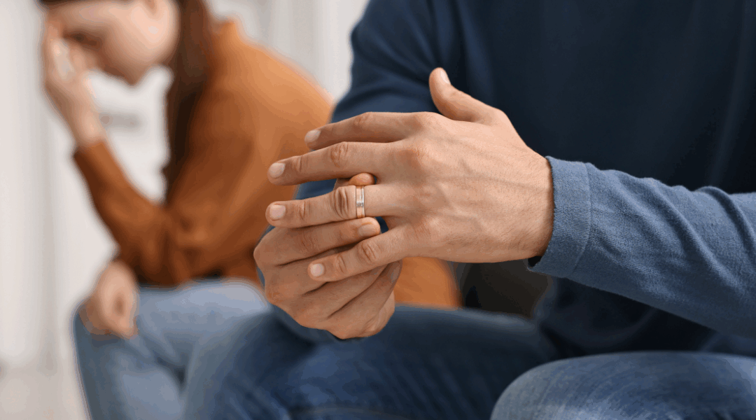 man holding ring in argument with partner